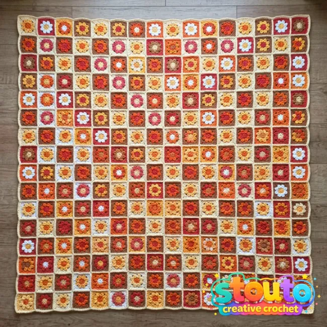 Crochet flower granny squares arranged as a colourful blanket project.