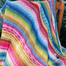 Crochet sampler blanket showcasing different stitch textures
