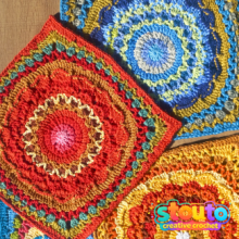 Sunrise bloom granny square in deep red, burgundy, wine, chocolate brown and warm neutrals