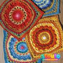 Try using one colour family for the flower, a contrasting shade for the surrounding rounds, and a neutral or darker colour