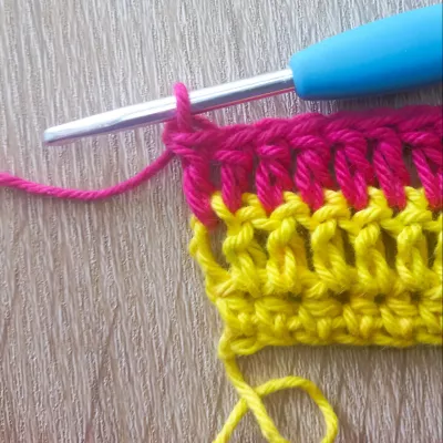 1 double crochet stitch into each row
