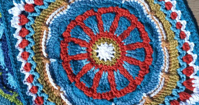 TMBJGF Flower Granny Square crochet pattern with a textured floral centre.